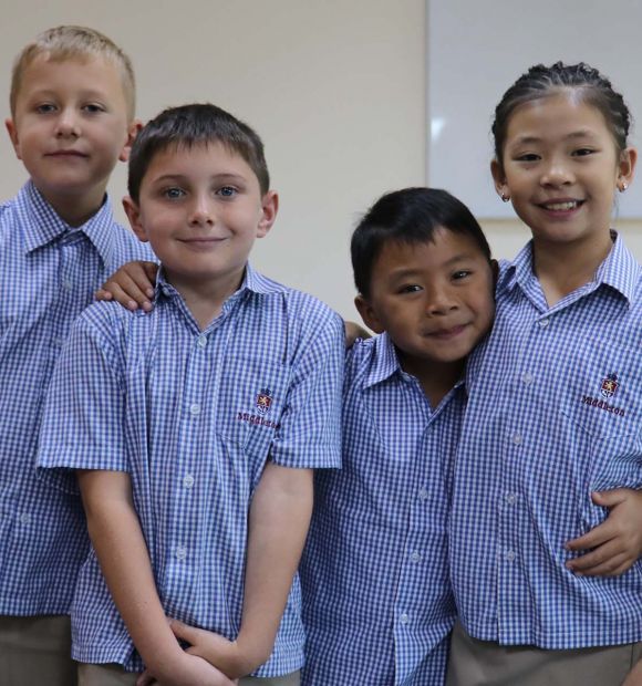 students smiling at camera