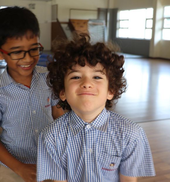 Children smiling at camera