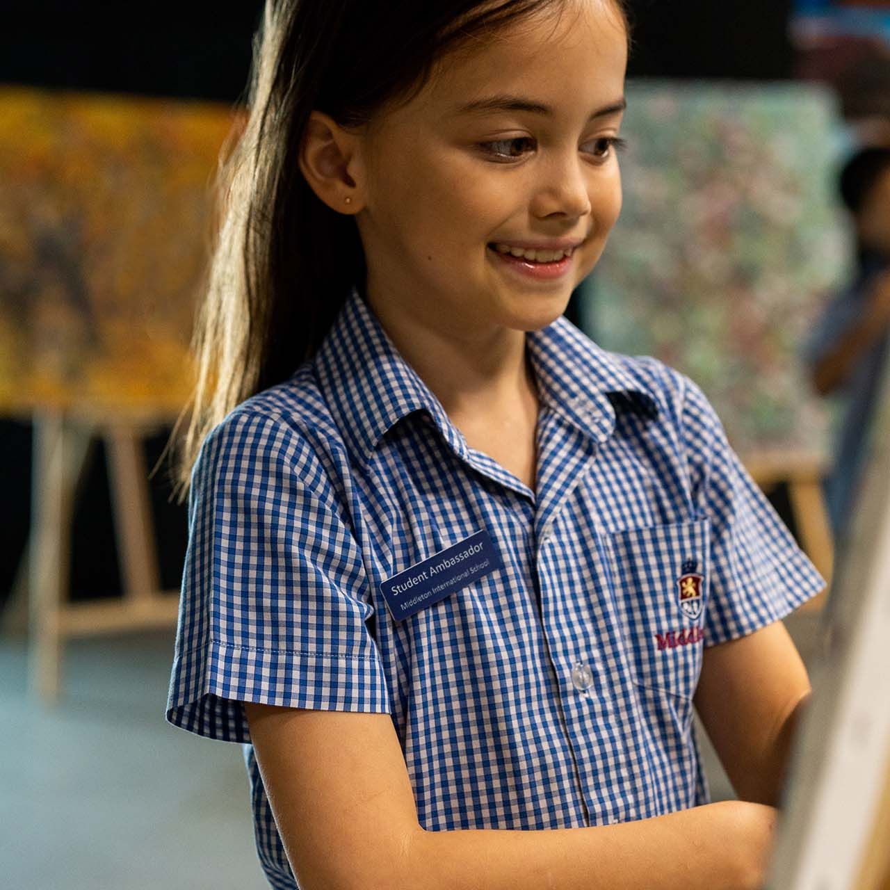 student doing art